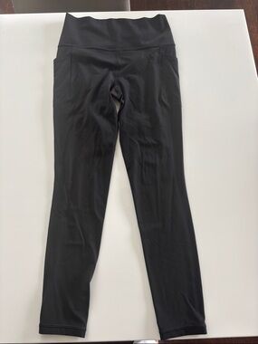 Never worn Athleta Black Salutation Stash Tight